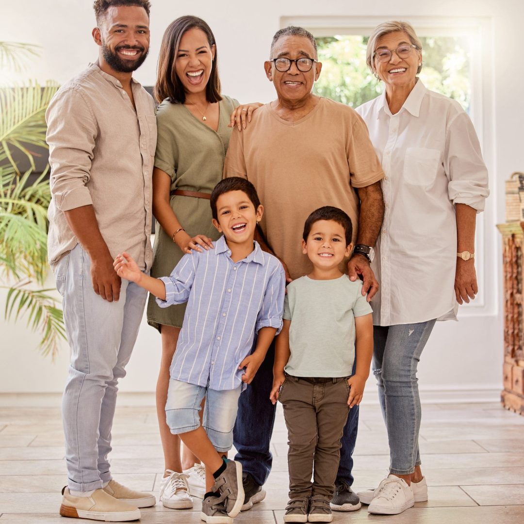big-family-portrait-and-bonding-in-home-together-2023-11-27-05-11-43-utc Big family, portrait and bonding in home together with grandmother, grandfather and children. Gener.